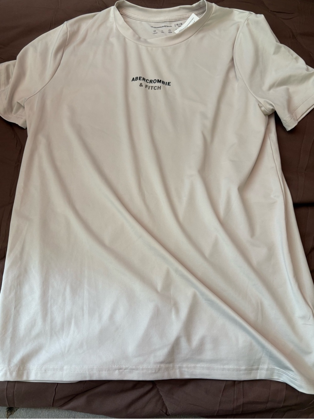 Bundle 3 for $15. NWT Abercrombie & Fitch Kids Cream Crewneck Tee. Size 14-16.